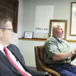 Dan Rich, president of the Centralia Community Foundation, discusses the partnership it has created with the Centralia School District in order to receive a $2 million grant from TransAlta, while Jonathan Meyer, secretary of the foundation and Lewis County prosecutor, looks on Tuesday morning.